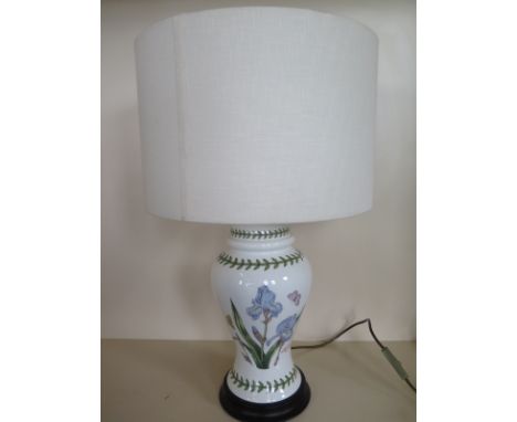 A table lamp, Portmeirion ceramic lamp base with botanic garden design, fitted with white lampshade, in good condition, 66cm 