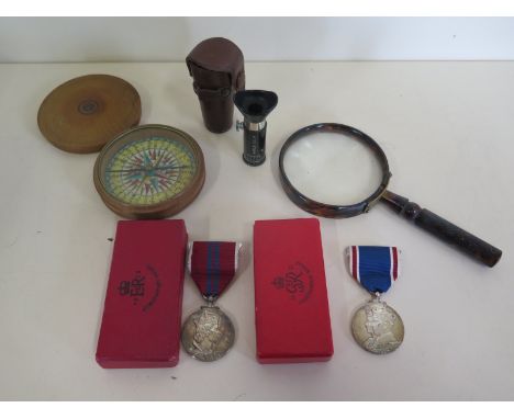 A George VI and a Queen Elizabeth II Coronation medals with original boxes together with other collectables, magnifying glass