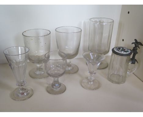 A collection of seven 18th century and 19th century glassware including three runners and tankard with enamel lid, tallest 20