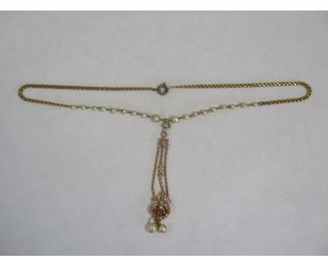 A gold necklace with pearls and sapphire ruby drop pendant, approx 38.5cm long, approx 10.9 grams, in good condition 