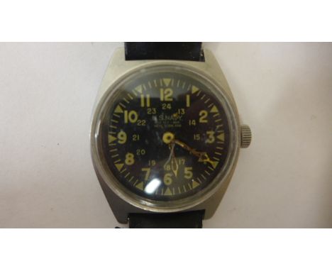 A gents 35mm manual wind military watch, running but centre second hand missing, pinion still present, military marks to reve