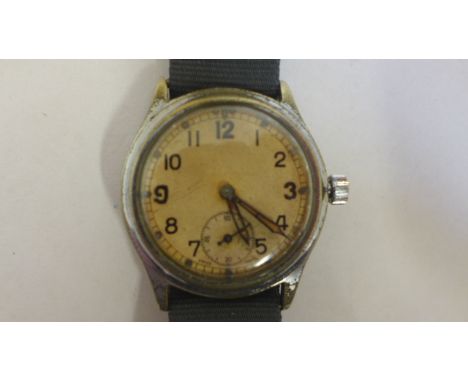 A gents WWII era pilots watch, probably hydro graphic service but engraving ver rubbed on back, white dial, manual wind, 15 j