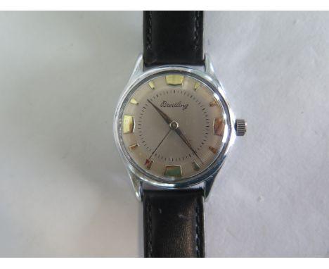 A vintage Breitling mid size wristwatch, 34mm wide including winder, running order, case has been polished, possible replacem