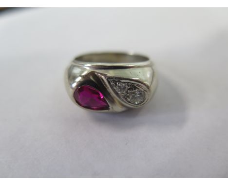 A 14ct white gold ruby and diamond ring, size N, approx 6.4 grams, in good condition 