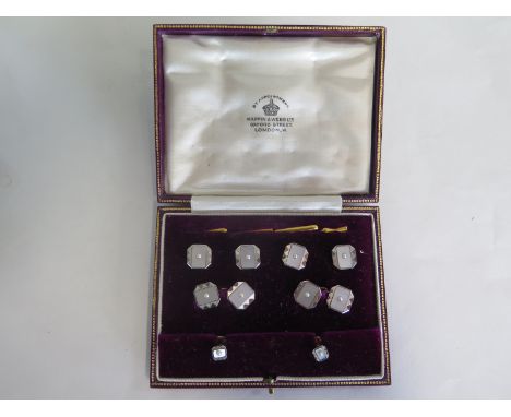 A gentlemans waistcoat button, cufflink and stud set, marked 9ct and 18ct, retailed by Mappin and Webb, total weight approx 9