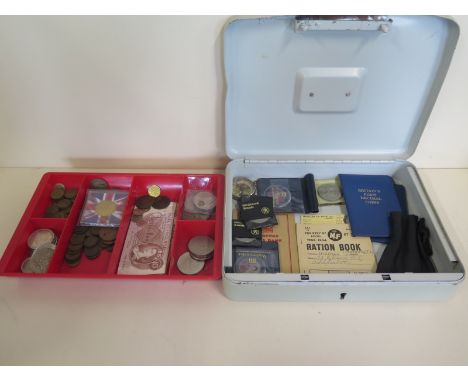 A tin of vintage bank notes, coins, ration book etc