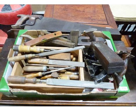 A box of vintage hand tools to include planes, saws, files, spirit levels etc.