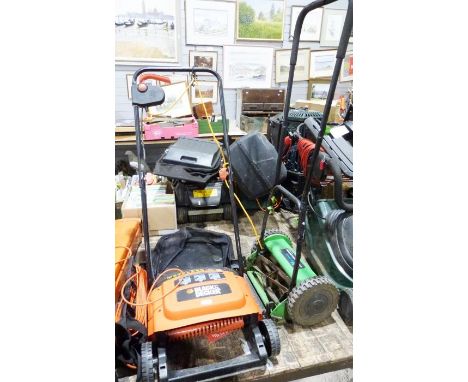 Black and Decker electric rotary lawn rake together with a Veri-Green 12-inch manual cylinder lawn mower (2)