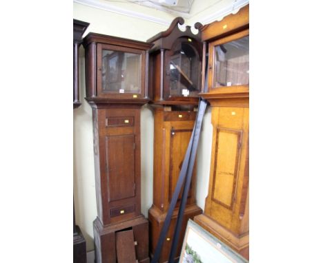 A George III oak and mahogany longcase clock case, 210cm high. 