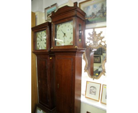 An early 19th century oak 30 hour longcase clock, with 12 inch square painted dial, 207cm high, with weight and pendulum.