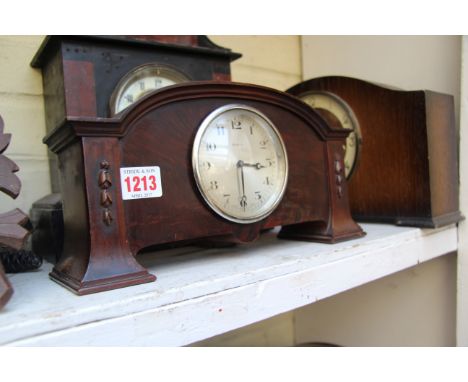 Four old mantel clocks; together with a cuckoo type clock. 