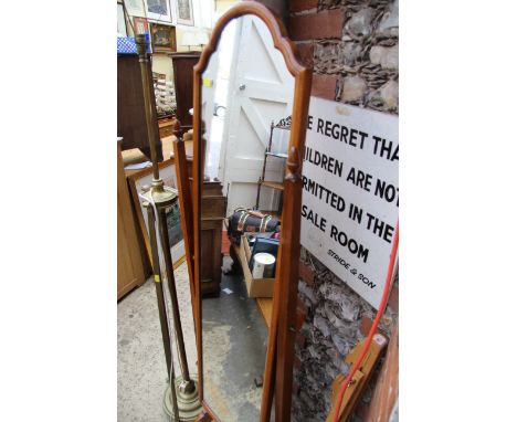 An old brass adjustable standard lamp. 