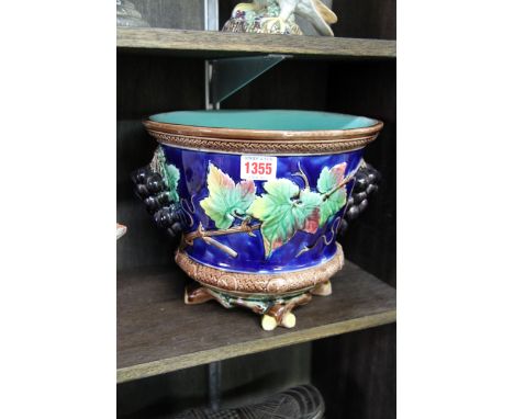 A majolica twin handled jardiniere, 20.5cm high.    Condition Report:  This item is in good condition, there are minor chips 