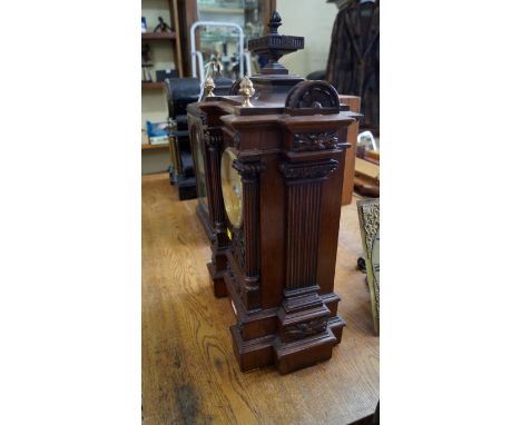 A circa 1900 French walnut mantel clock, striking on two gongs, 52cm high. 