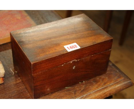 A 19th century mahogany tea caddy, 20.5cm wide. 