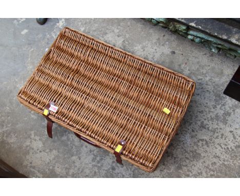 A vintage Brexton wicker picnic hamper, with contents. 