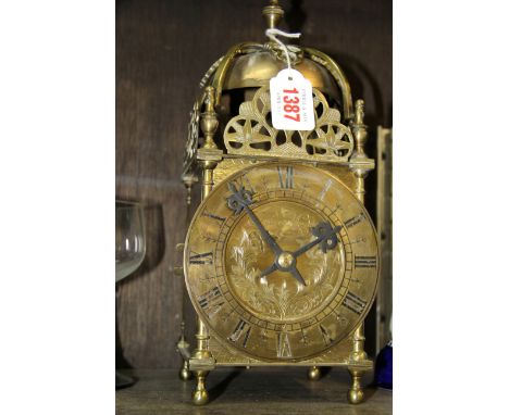 A reproduction brass lantern clock, 30cm high. 