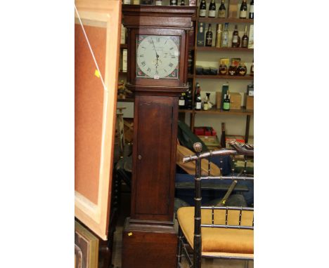 A George III oak 30 hour longcase clock, the 11 inch square painted dial inscribed 'Oliver Langley, Brinkworth', 201.5cm high