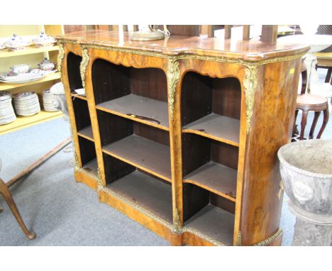A good Victorian burr walnut and gilt brass mounted breakfront open bookcase, 142cm wide.    Condition Report:  Commensurate 