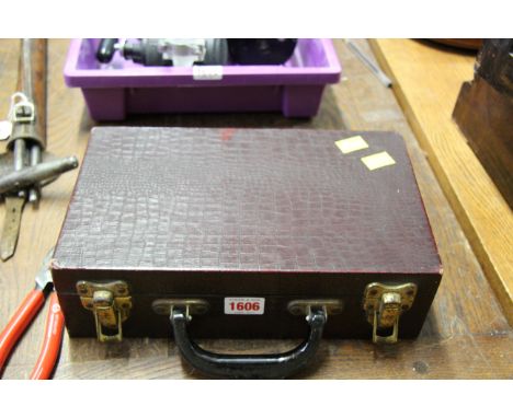A Boosey & Hawkes '77' clarinet, in padded box. 