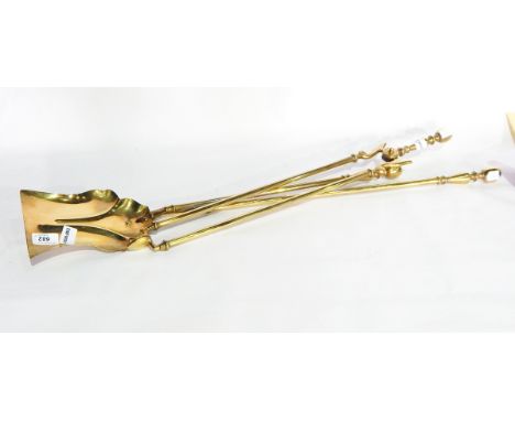 A set of three 19th century brass fireside tools including pair tongs, all with ovoid and knopped handles 