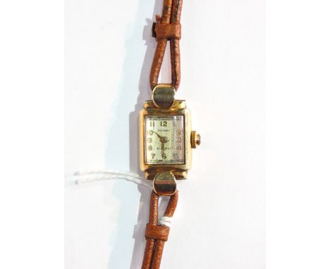 Lady's Rotary 9ct gold wristwatch in rectangular case with raised arch glass face 