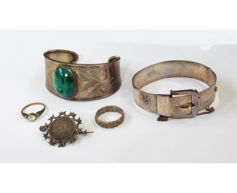 A silver and hardstone bangle set oval green variegated stone, maker EJ Limited, having Birmingham assay, another buckle-patt