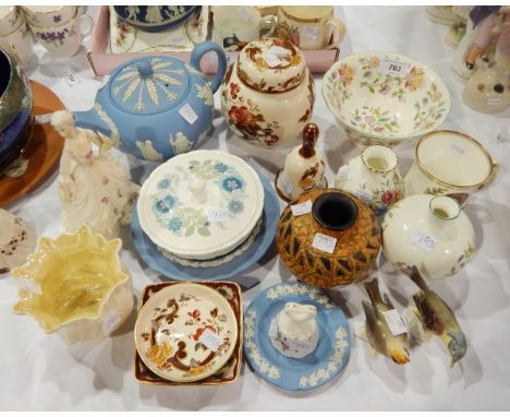 A Belleek porcelain lustre glazed small bowl, spirally ribbed, a Wedgwood Jasperware teapot and other items, two Goebel porce