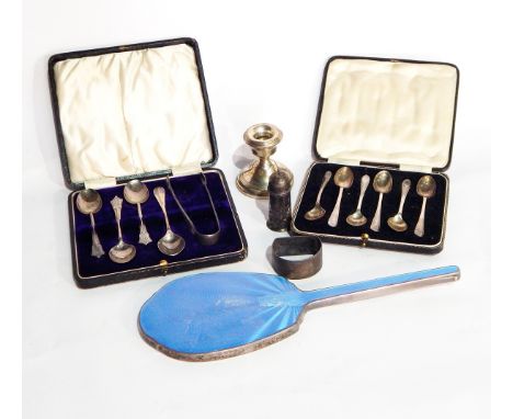 A set of six silver coffee spoons, Sheffield 1935, cased, a set of four silver teaspoons, a pair of sugar nips, Birmingham 19