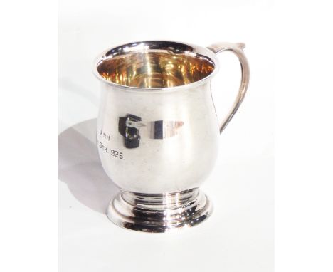 A George V silver christening mug of baluster form, raised on a circular foot, Birmingham 1925, 2oz approx., height 7.5cm tog