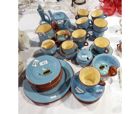 Torquay pottery tea service with seagull decoration, on a blue ground 
