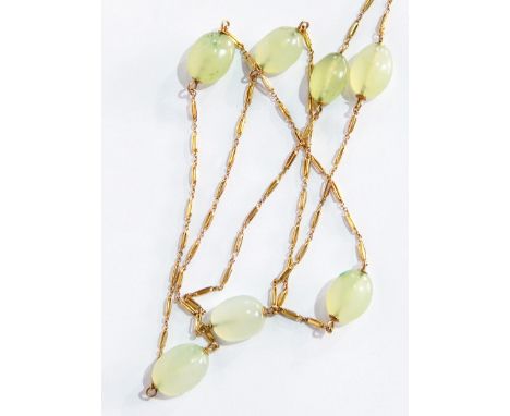 A 9ct gold faceted crystal style pendant on gold-coloured rope-twist chain, citrine coloured swivel fob on gold-coloured moun