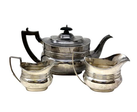 An Edwardian silver harlequin three piece tea service, Edward Barnard &amp; Sons Ltd, London 1898 and 1906. (3) CONDITION REP