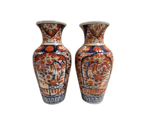 A pair of 19th century Japanese Imari vases, height 30 cm. (2)