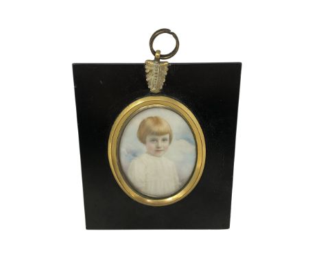 An early 19th century portrait miniature depicting a child, 5 cm x 6.5 cm, indistinctly signed to lower right. CONDITION REPO