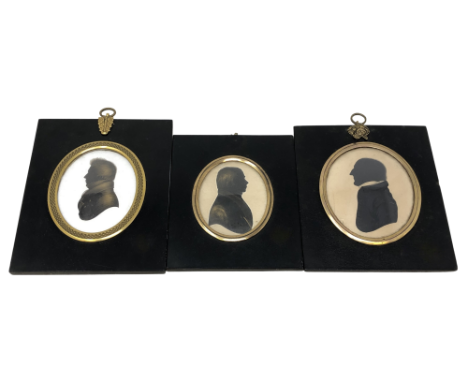 Three early 19th century silhouette portrait miniatures, each in gilt brass mounted lacquered frames. (3) CONDITION REPORT: A