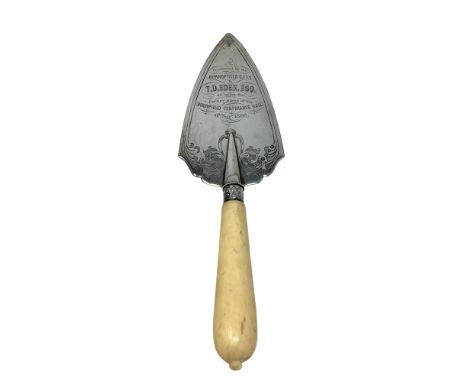 A silver and ivorine presentation trowel, with inscription 'Presented by the Burnopfield CETS to T D Eden Esq on the Laying o