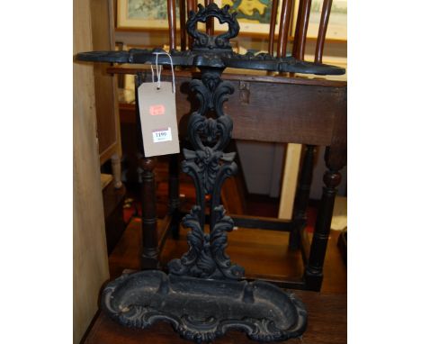 A Victorian black painted cast iron two division stick stand