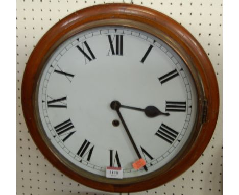 A Victorian mahogany circular wall clock, having restored white enamel dial