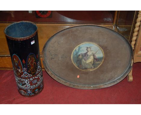 A large Victorian Toleware twin handled tray, the central panel depicting a seated maiden, width 76cm, together with an early