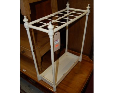 A Victorian white painted cast iron twelve division stick stand, width 50cm