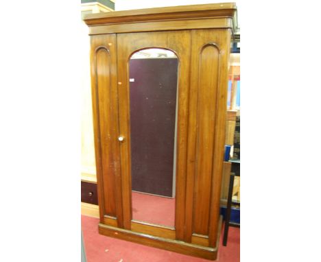 *A Victorian mahogany round cornered single mirror door wardrobe, width 125cm