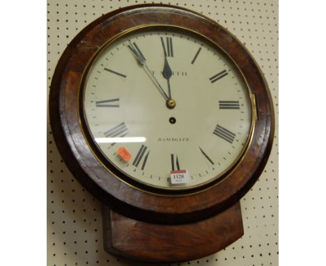 A Victorian walnut and figured walnut circular short drop trunk wall clock having a single fusee movement 