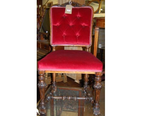 A 19th century French oak and red button back upholstered single dining chair