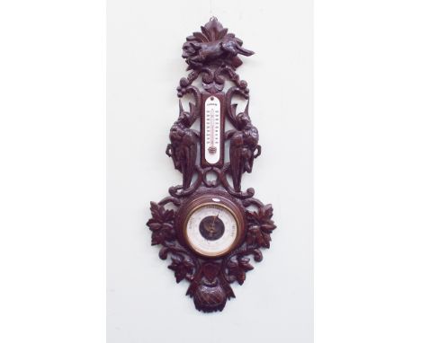 carved oak black forest style wall barometer and thermometer 