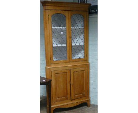 Light oak leaded glazed corner cabinet with cupboard under 