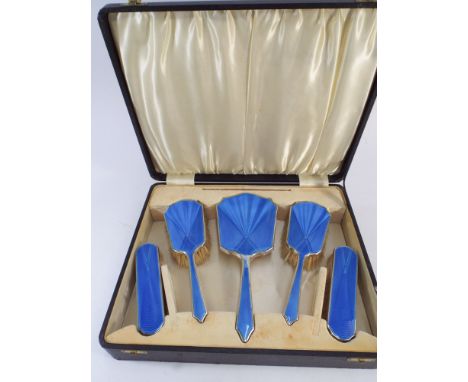 Boxed silver pale blue engine turned enamel hairbrush set   Condition - enamel damaged to hairbrush handle