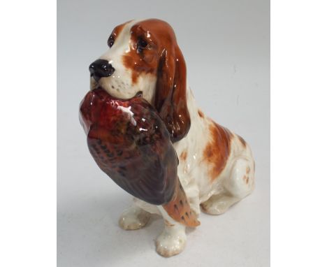 Royal Doulton model of a Springer Spaniel with a pheasant in its mouth, numbered on base HN1001