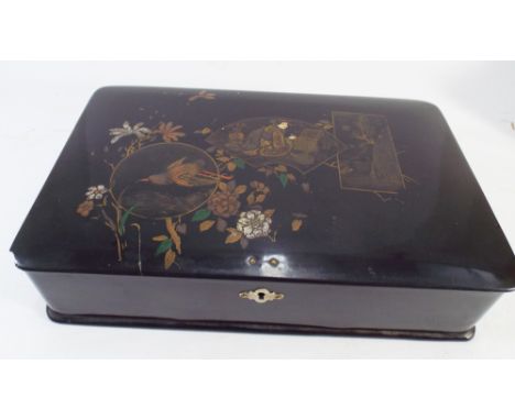 Japanese black lacquer trinket box, the lid decorated with chinoiserie scenes.  17 x 28cm  Condition - one corner chipped 
