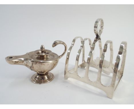 Hallmarked silver Aladdin lamp table lighter and a silver toast rack - weight 4.7 oz troy